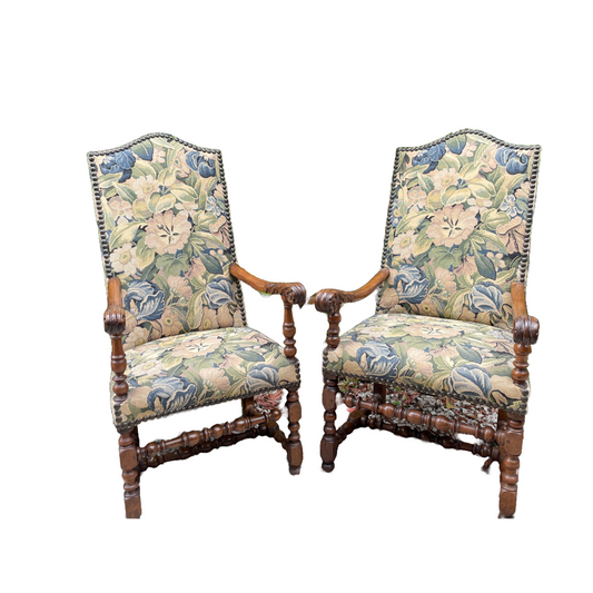 A pair of Louis XIV high back walnut armchairs, 18th century